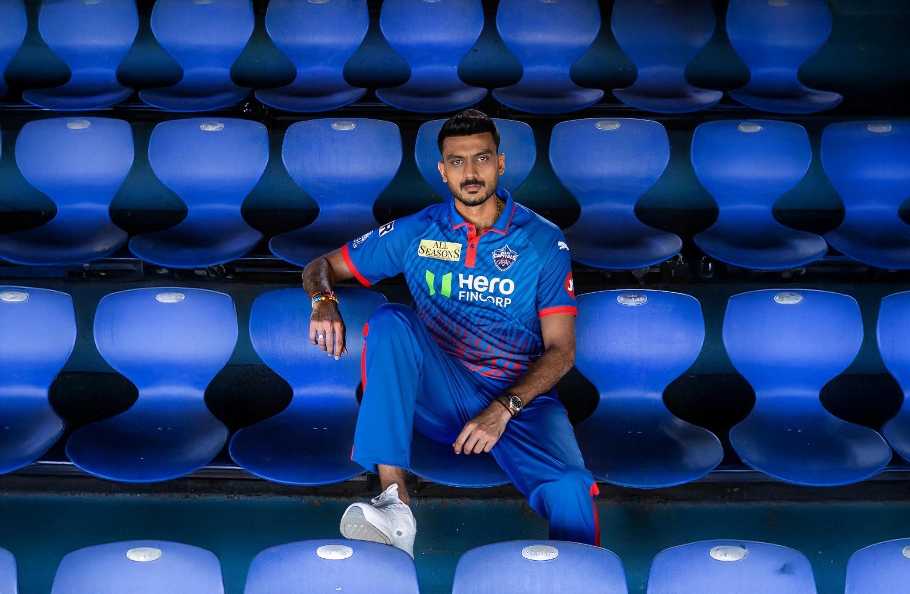 Delhi Capitals IPL 2026 jersey and cap photographed in studio