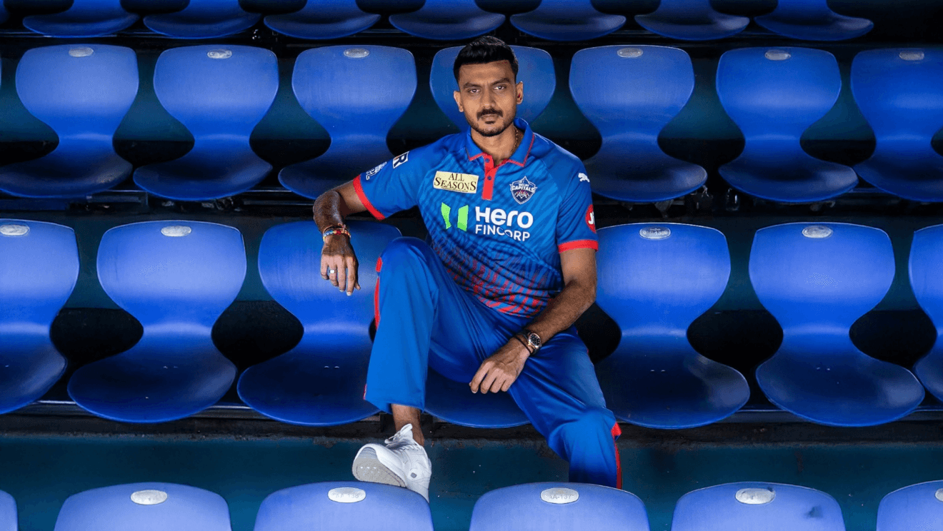 Delhi Capitals tiger-stripe branding extended across stadium seating
